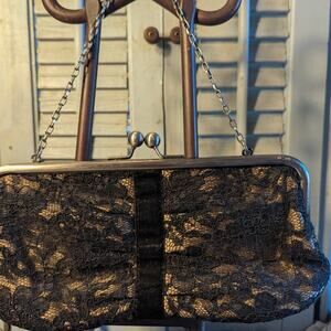 Black floral lace evening clutch with gold base layer